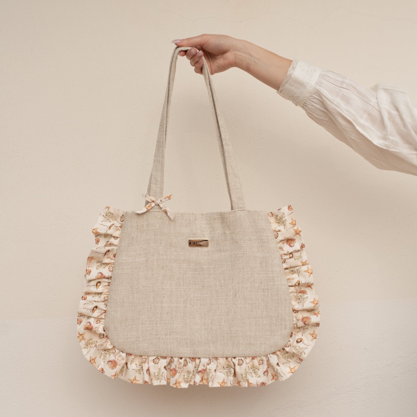 INES BYTHESEA Shells